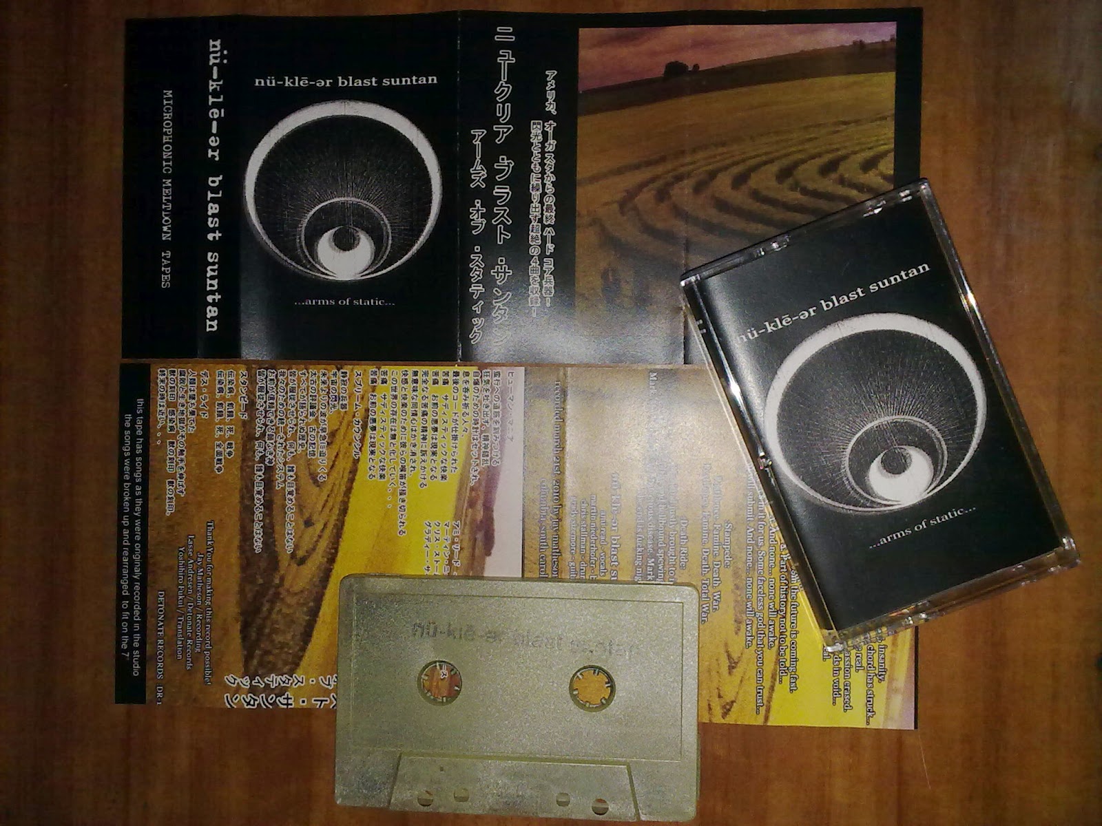 N�-KLĒ-ƏR BLAST SUNTAN - Arms of Static Cassette